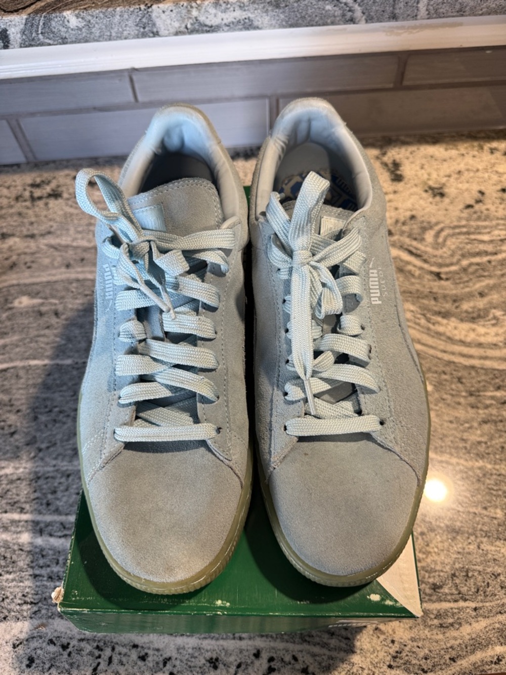 Puma Suede Low-Top Sneakers in Light Blue